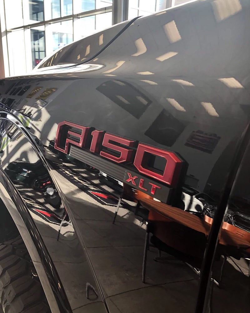 Custom Black & Red Emblems at All American Auto Group in Old Bridge NJ